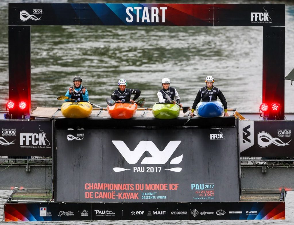 Paddlers on the launching Ramp at a boatercross kayak race